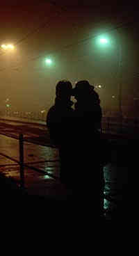 couple at night on wet street