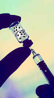 closeup composite photo of syringe being filled - the bottle contains dice